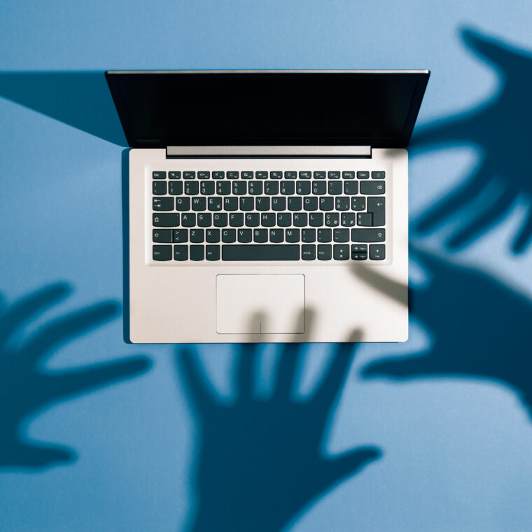 Threatening,Hands,Attacking,A,Laptop,And,Stealing,Information:,Cyber,Crime,