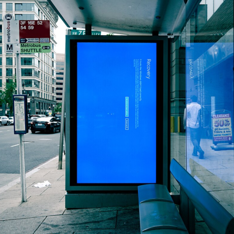 Bus shelter sign in Windows recovery, after Crowdstrike IT meltdown